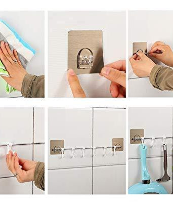 Plastic self-adhesive hooks, ideal for use in various settings.