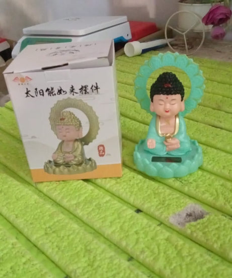 Plastic Solar Powered Moving Head Sitting Action Buddha Statue (1 Pc / Mix Color)