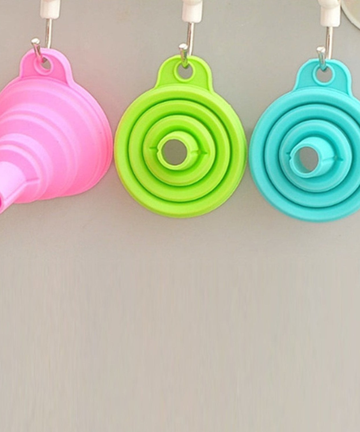 Foldable silicone funnel for kitchen use.