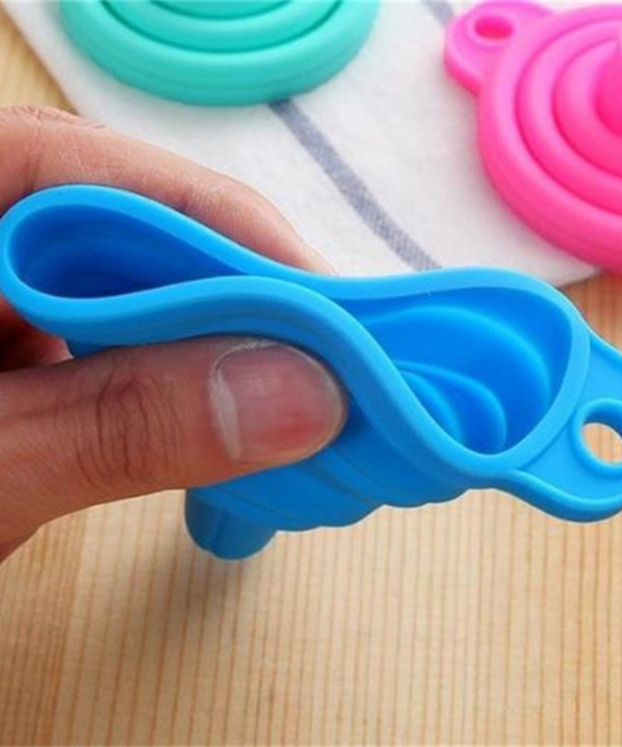 Multi-use silicone funnel for sauces and liquids.