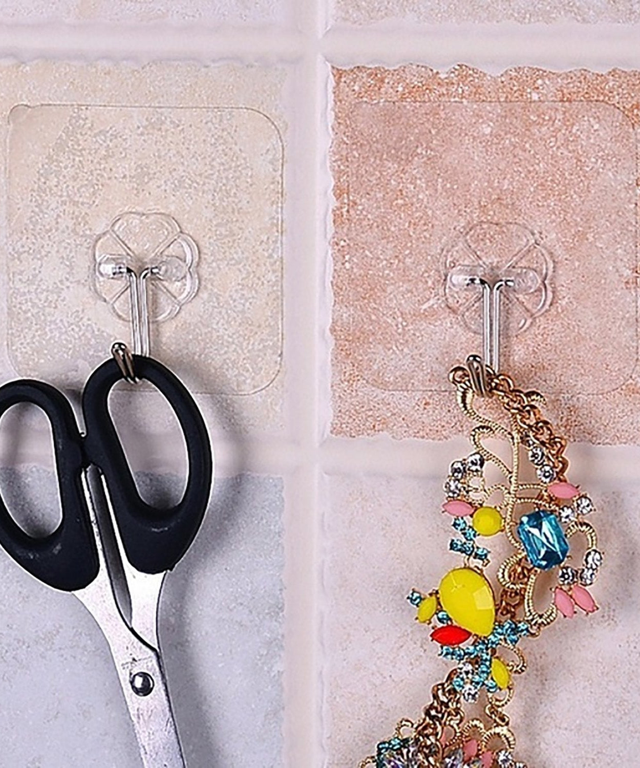Small strong adhesive wall hooks in stainless steel for versatile use