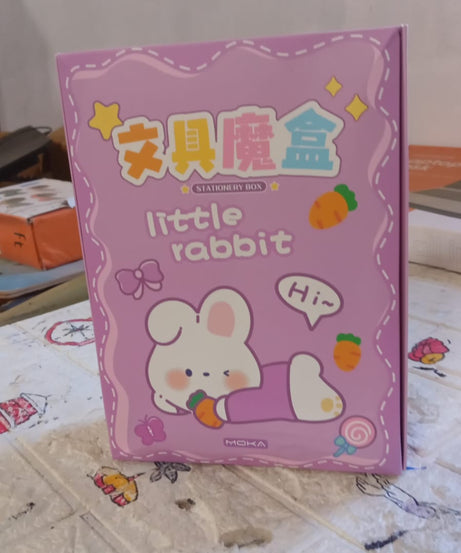 Cartoon school box with stationery items and refill pens