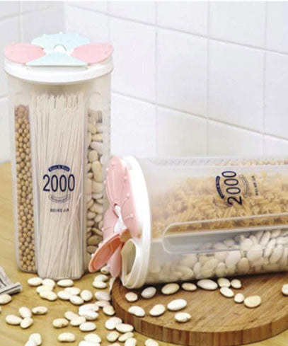 Transparent sealed 4-section storage box, ideal for kitchen organization.