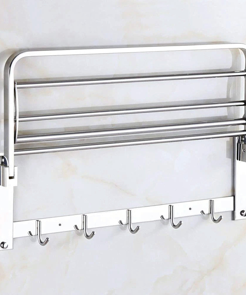 Stainless steel towel bar with foldable rack, 18 inches for compact bathroom storage.