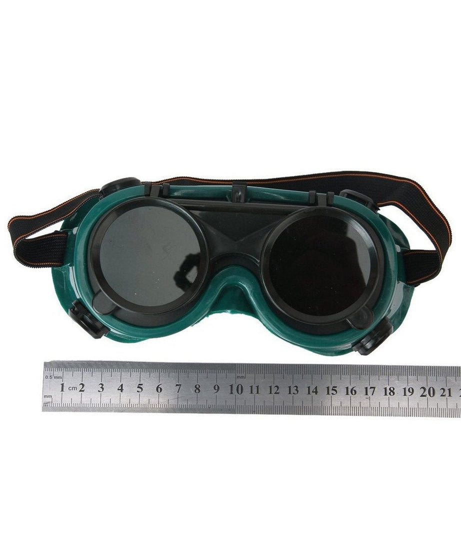 Large dark green welding goggles for safety.