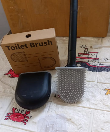 Toilet brush with ergonomic handle