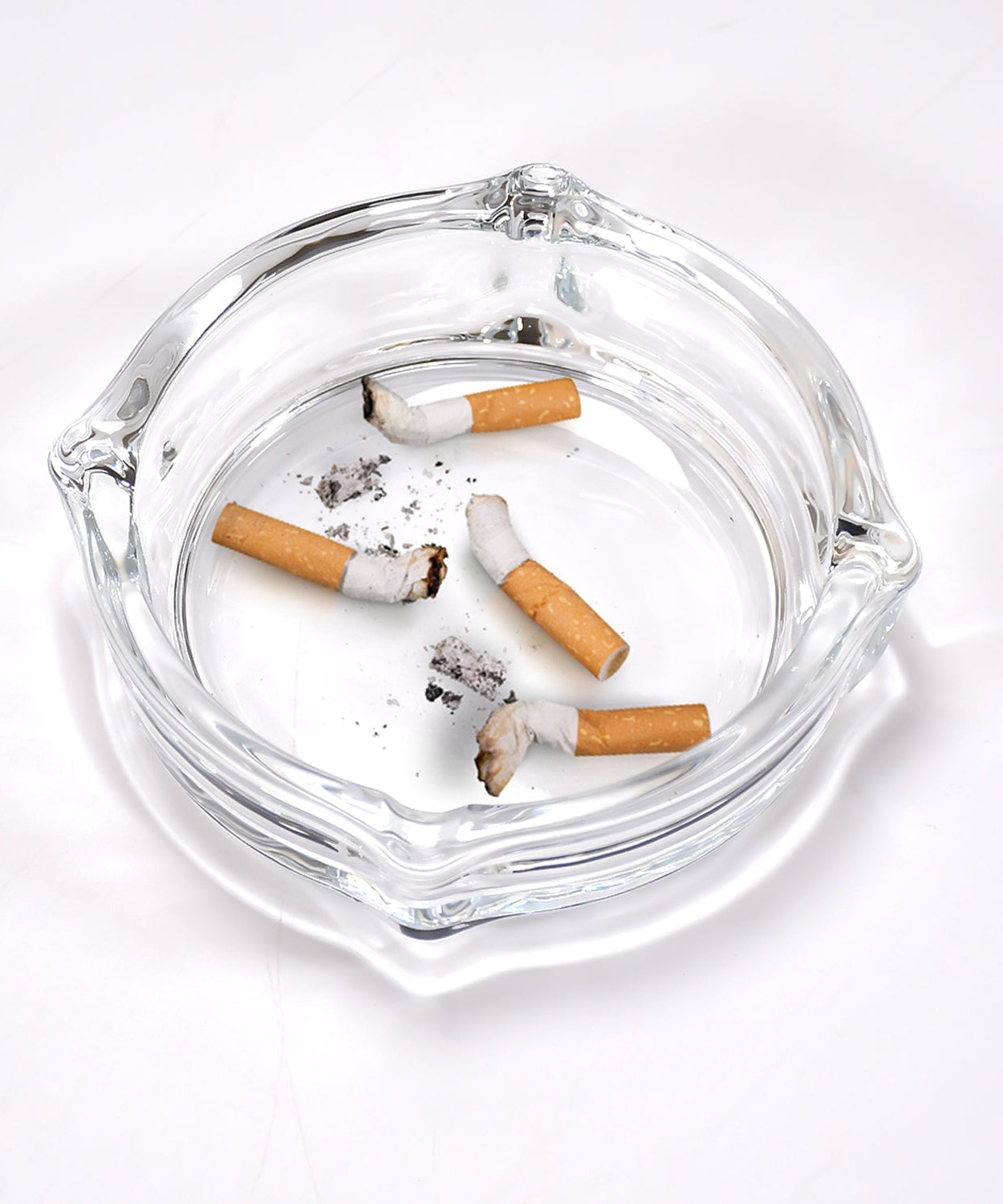 Crystal glass ashtray for cigars and cigarettes.