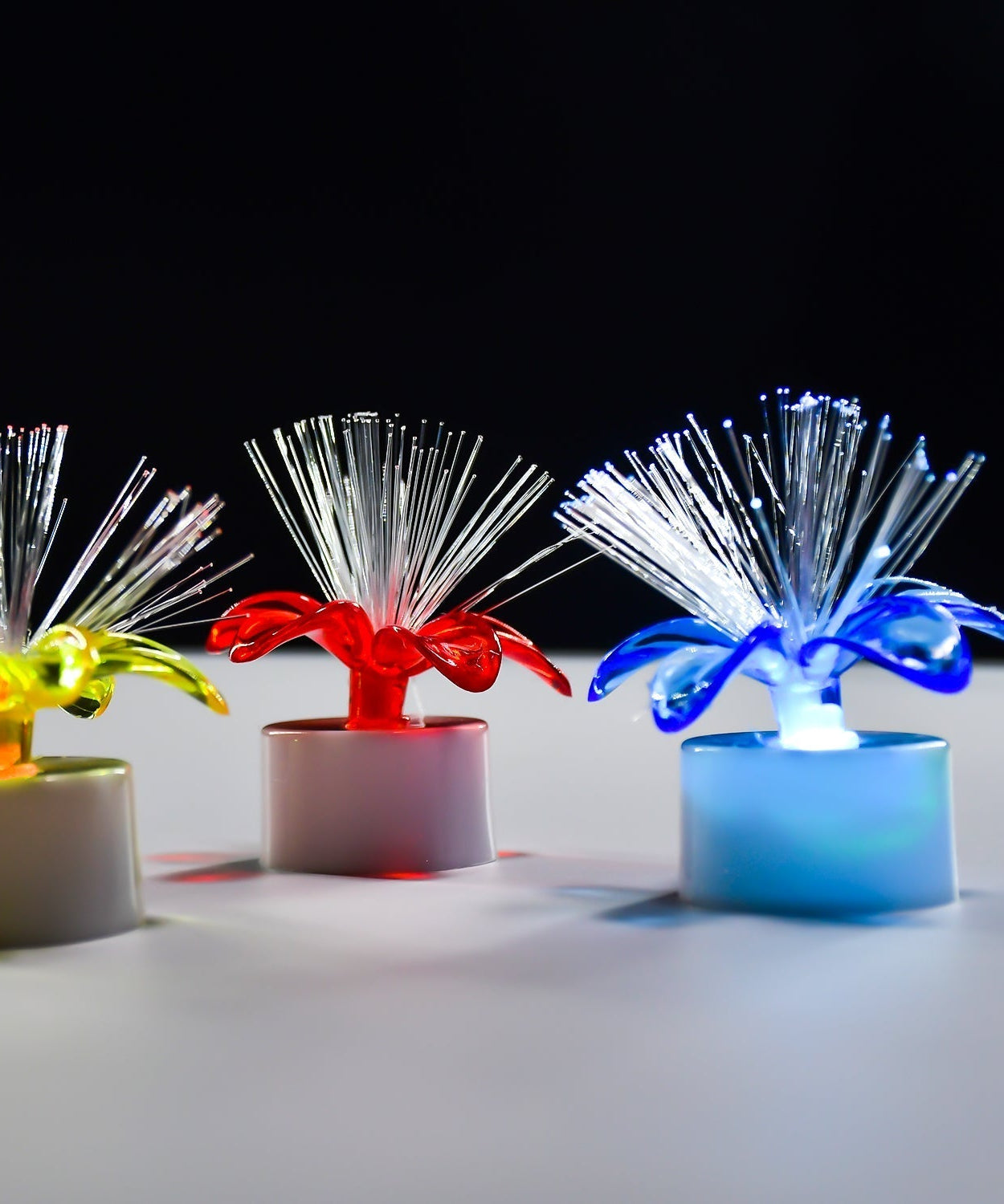 Color-changing LED table centerpiece with fiber optic light.