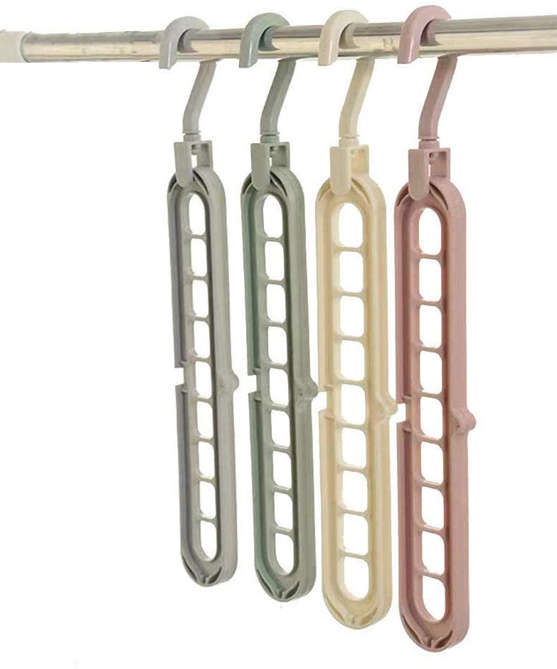 Magic wardrobe hangers with an anti-skid surface and multiple holes.