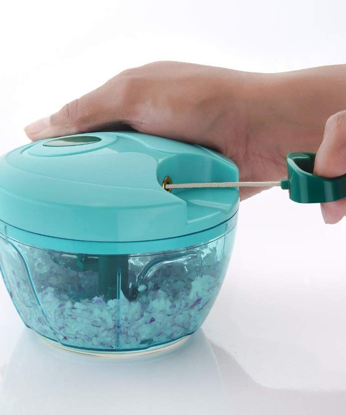 Vegetable chopper with stainless steel blades and brown package box.