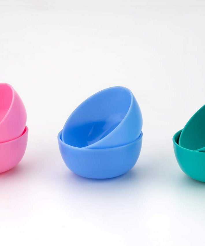 Set of three multipurpose snack items: spoon, bowl, and dish.