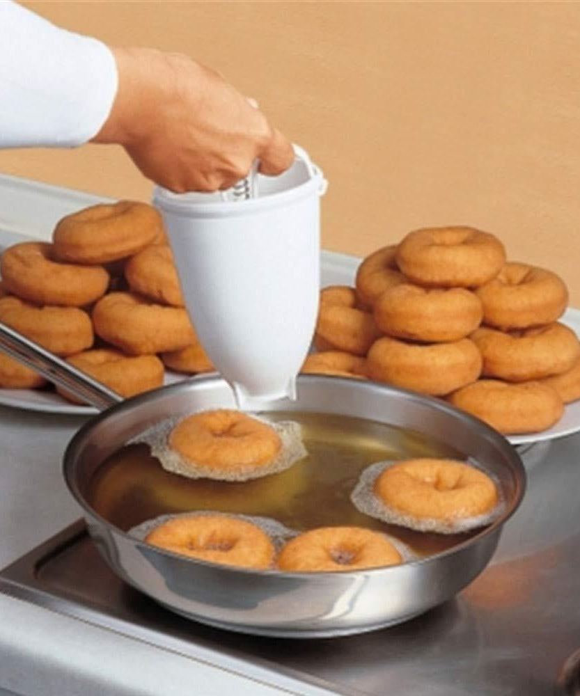 Simple donut and vada dispenser with easy grip for smooth operation.