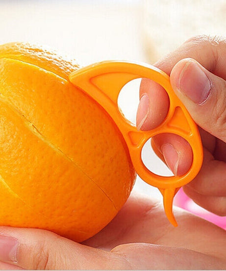 Ring-shaped peeler, snail design for oranges.
