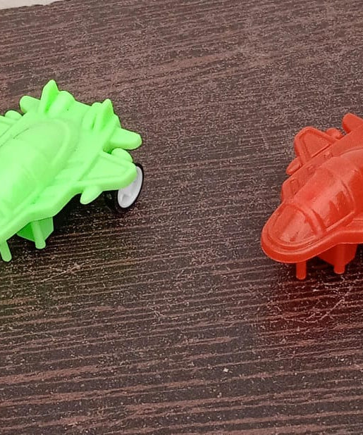Small pull back plane toy