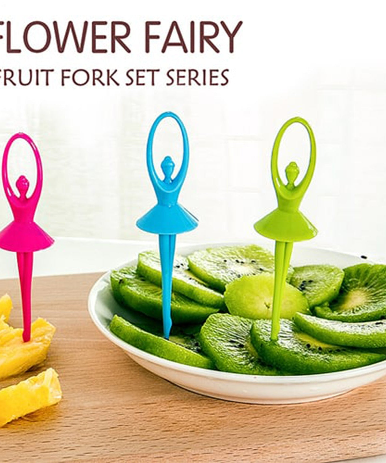 Fruit fork cutlery set with a playful dancing doll stand