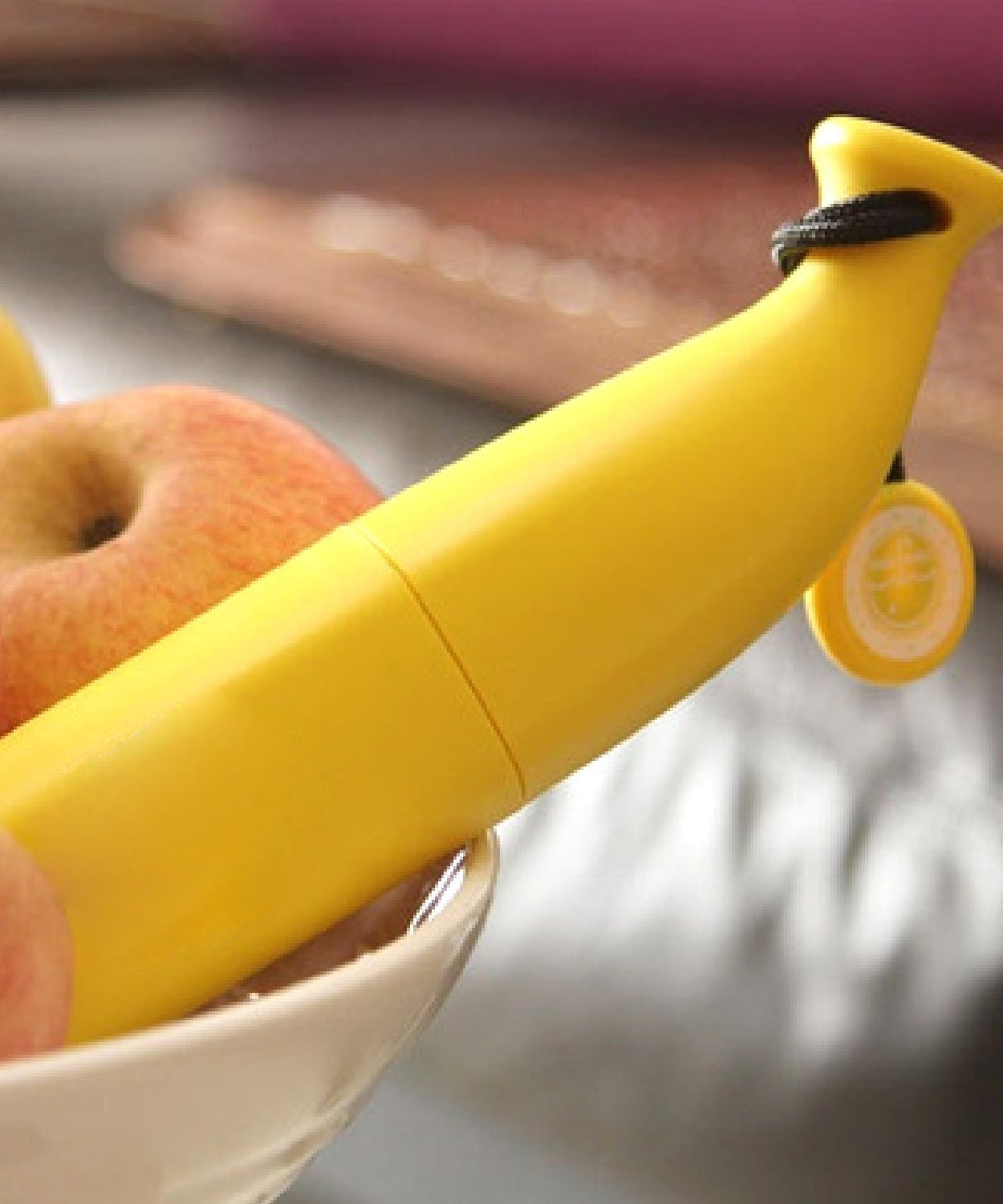 Foldable banana-shaped mini umbrella, compact and stylish.