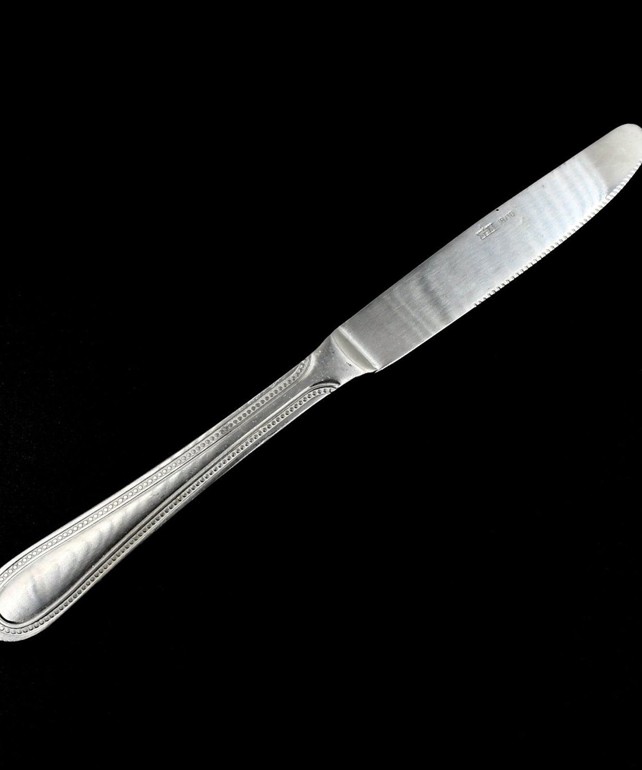 Steel handle kitchen knife with stainless steel blade, designed for durability.