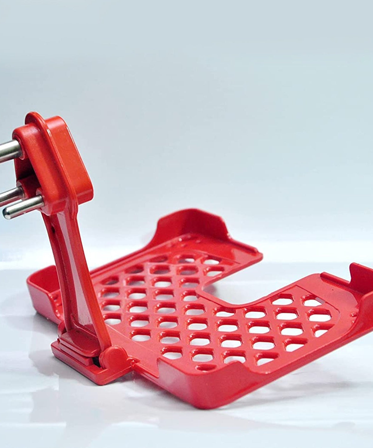 Red wall holder stand for mobile charging.