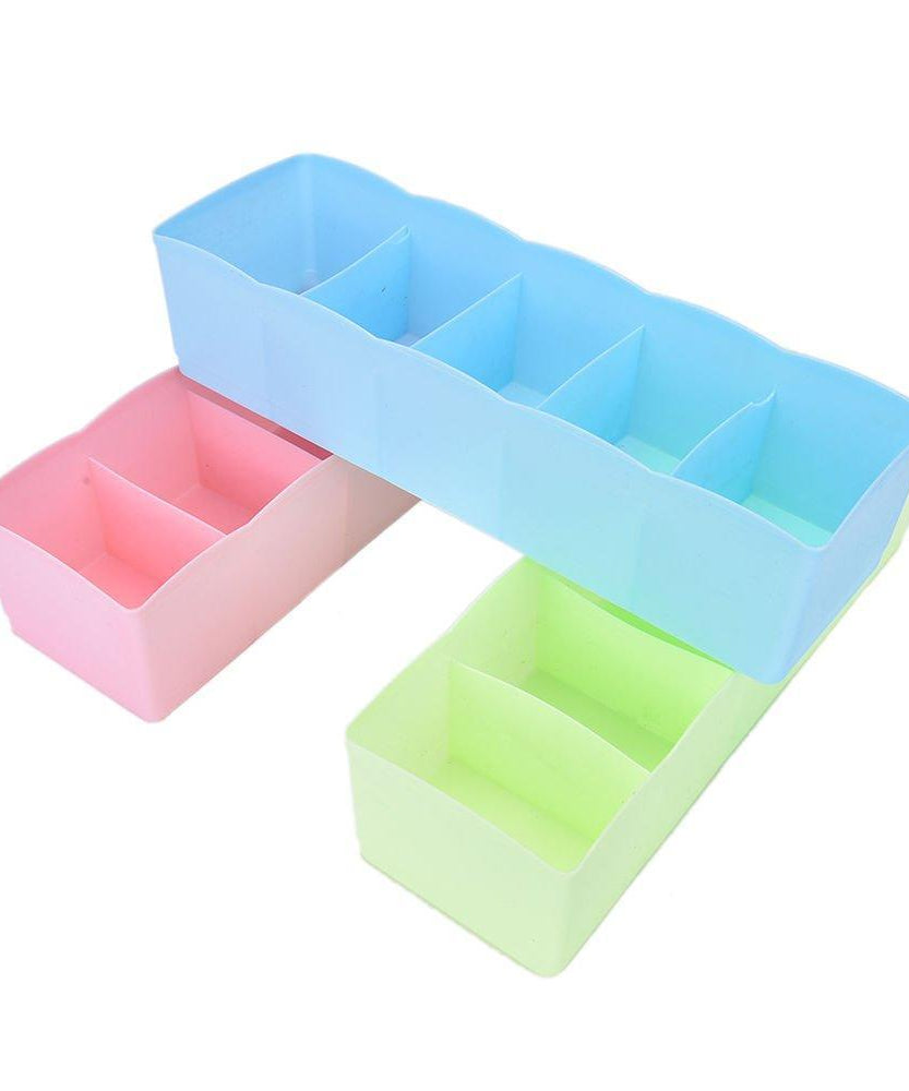 Compact 5-compartment storage organizer for socks and undergarments.