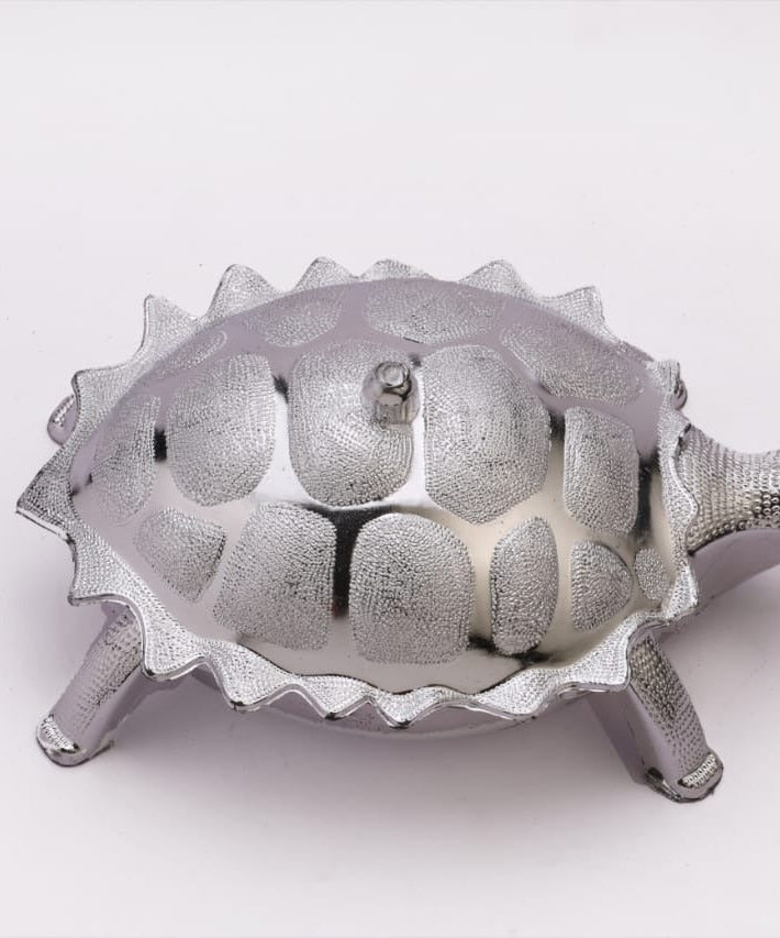 Tortoise-shaped container for dry fruits or presents.