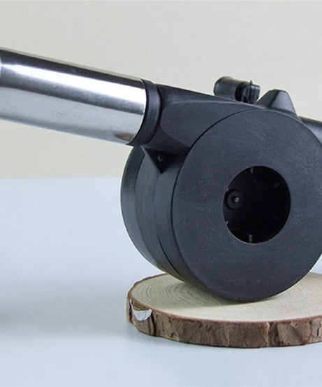 Portable air blower fan for charcoal grills and outdoor BBQs.