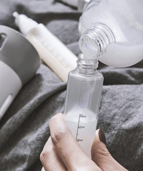 4-in-1 set of travel dispensers