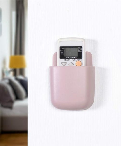 Wall-mounted phone holder.