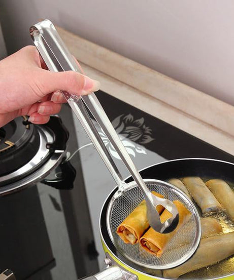 Stainless steel filter spoon with clip for kitchen use.