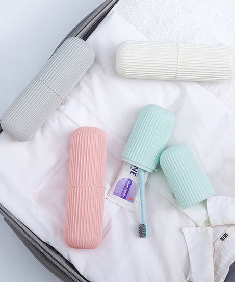 Compact storage organizer in capsule shape for versatile use.