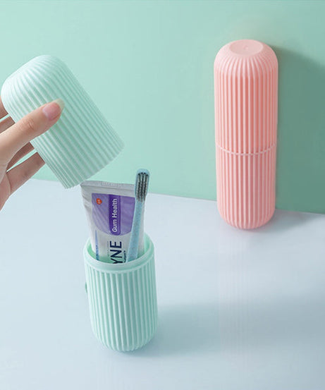 Capsule-shaped organizer for portable storage, available in multiple colors.