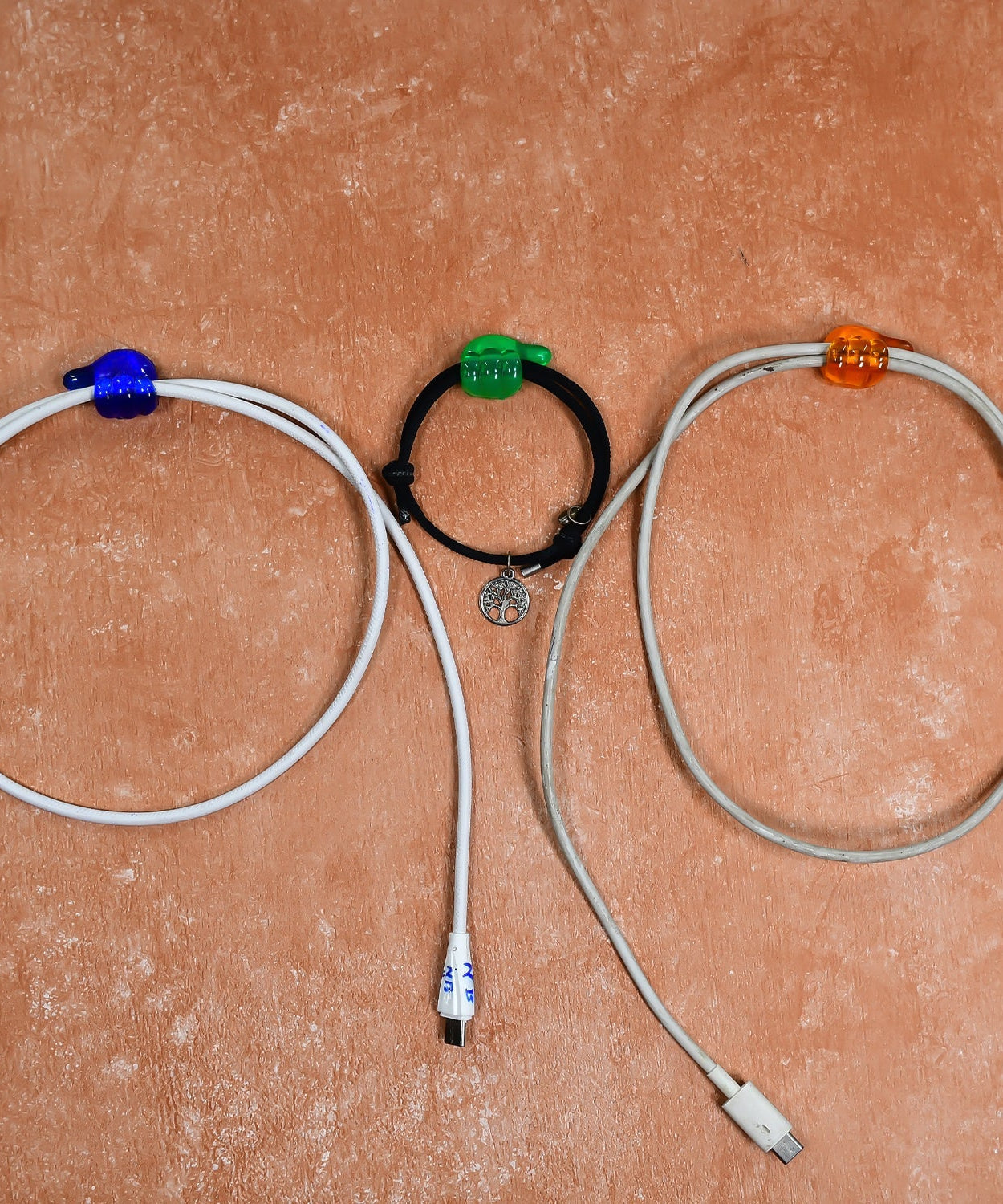 Multi-functional wall clip hangers for keys and cables.