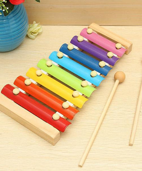 xylophone bars with vibrant colors and wooden base