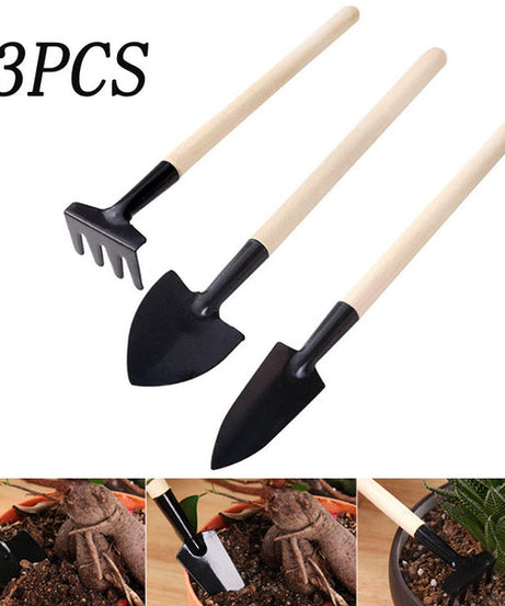 Kid's garden tool set with trowel, shovel, and rake