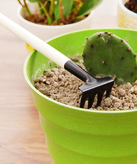 Kid's gardening set with trowel, shovel, and rake