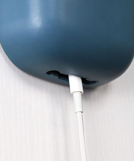 Multicolour remote storage box, wall mounted.