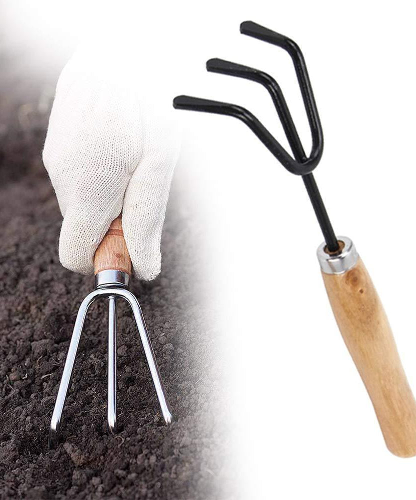 Set of gardening tools including shovel, rake, and trowel.