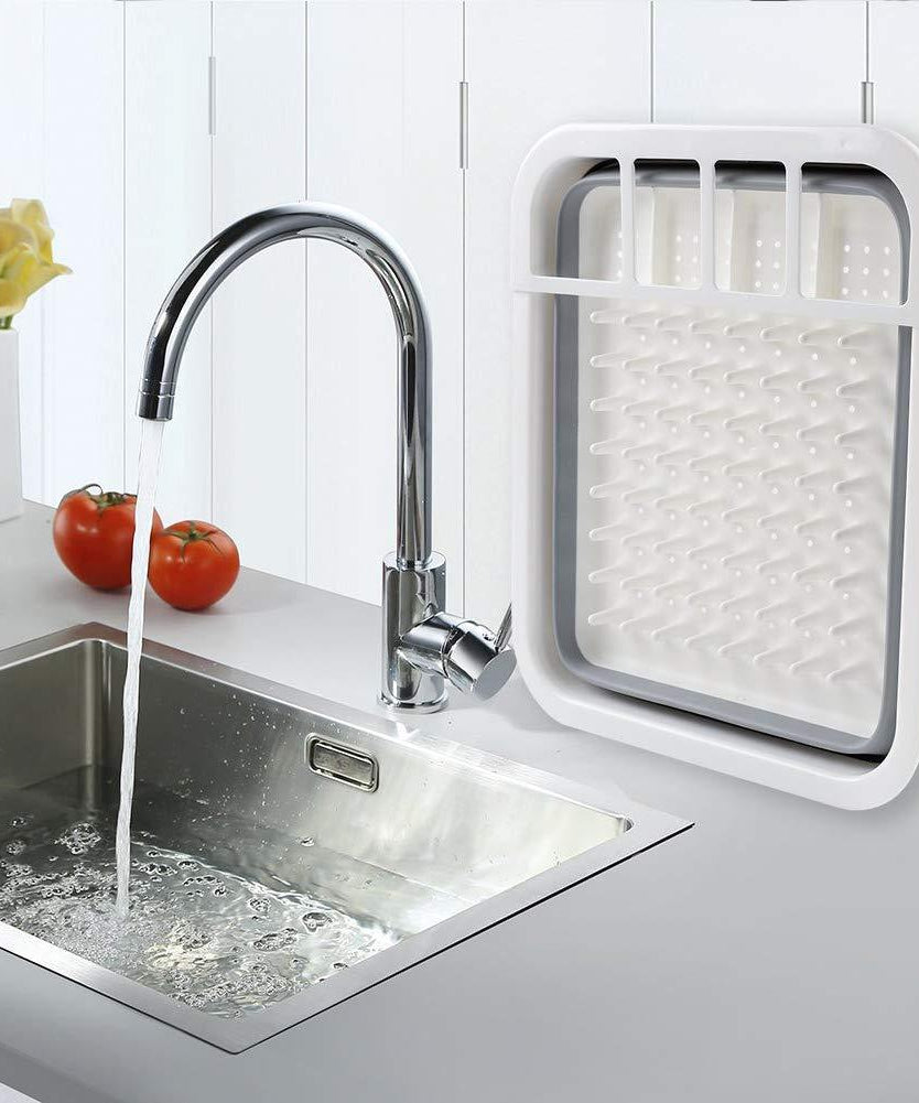 Folding silicone dish rack with storage for spoons, forks, and knives