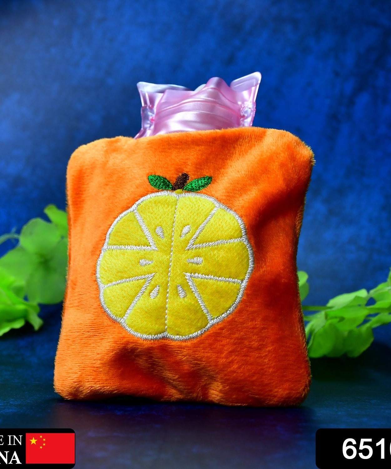 Small orange hot water bag for neck and shoulder pain relief