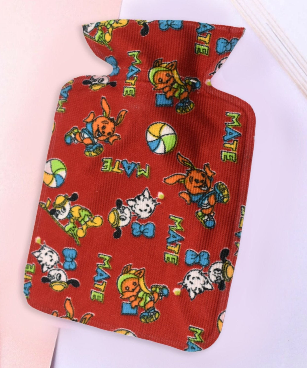 Personal care hot water bottle for pain relief, compact size.