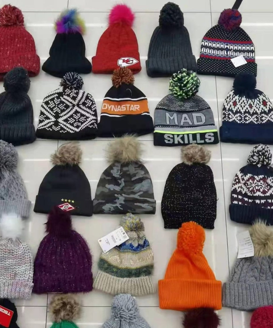 Cozy black knitted winter cap with fur lining