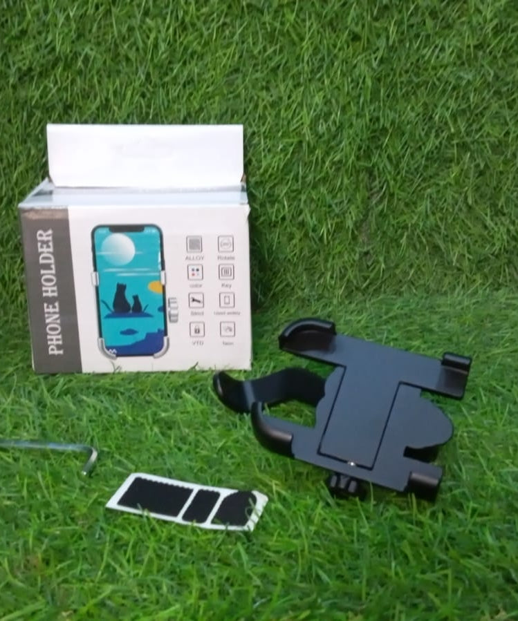 Rear view mirror phone cradle