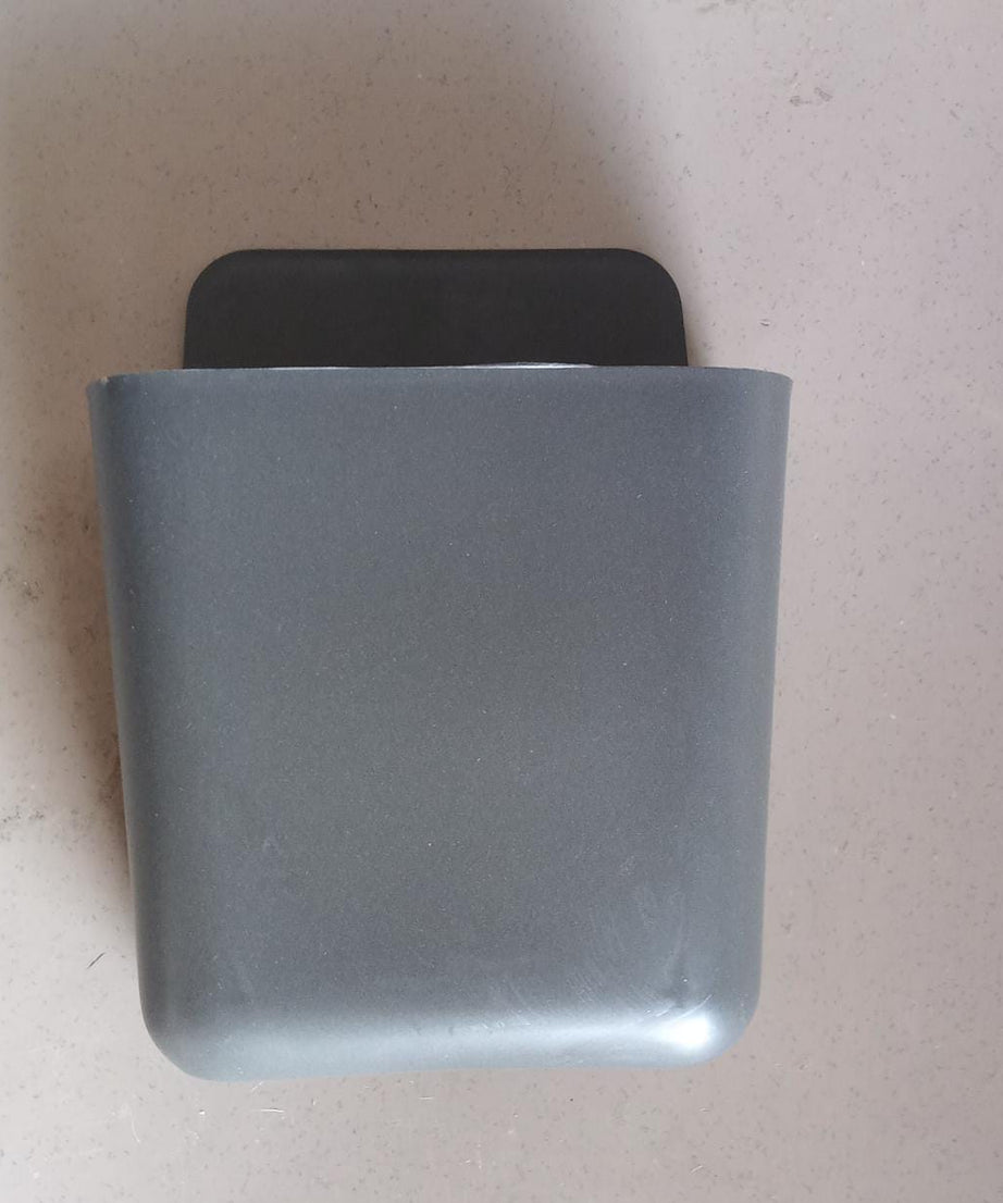 Multicolour remote storage organizer, wall mounted.