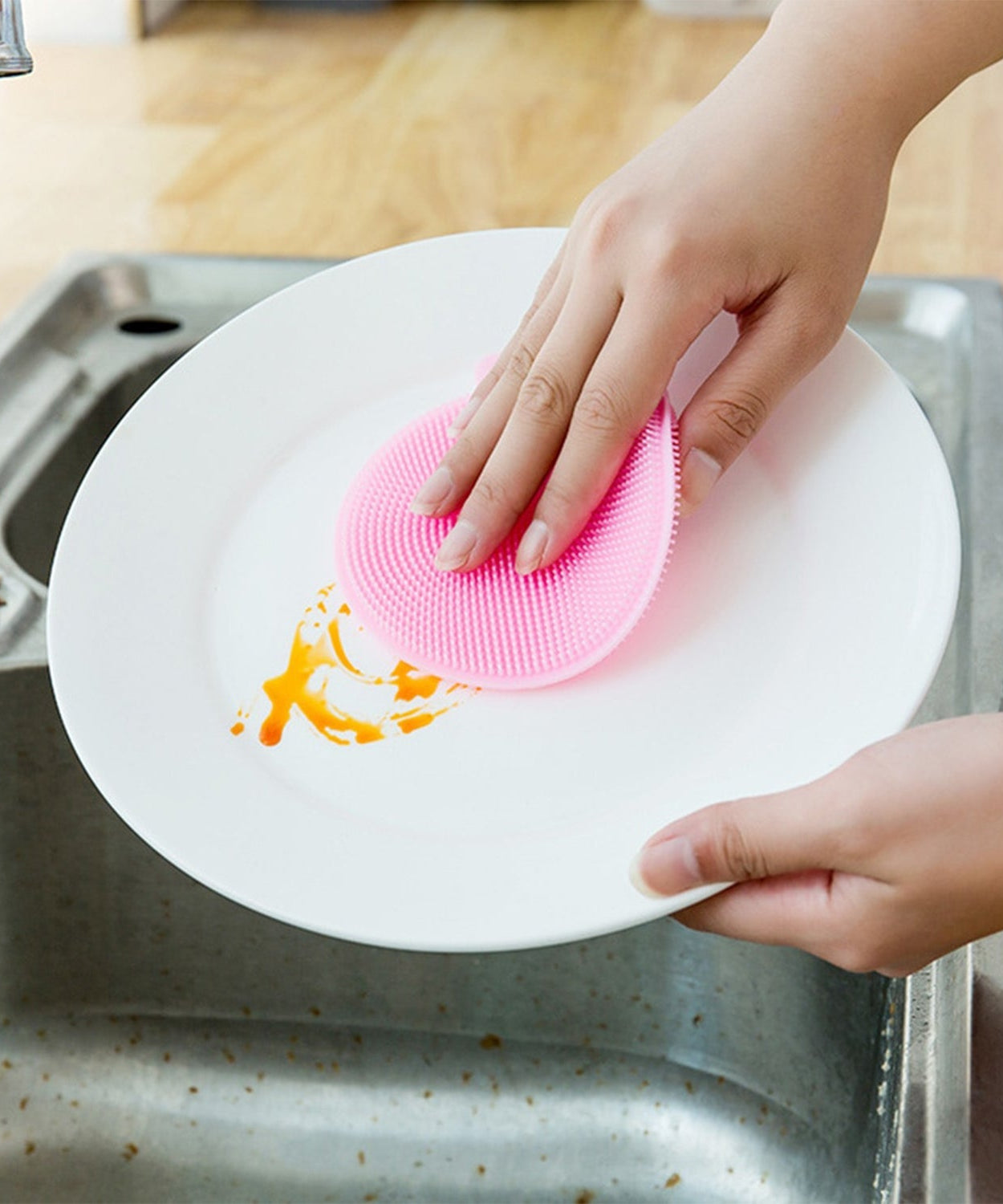 Mildew-free silicone dish sponge in assorted colors for easy scrubbing.