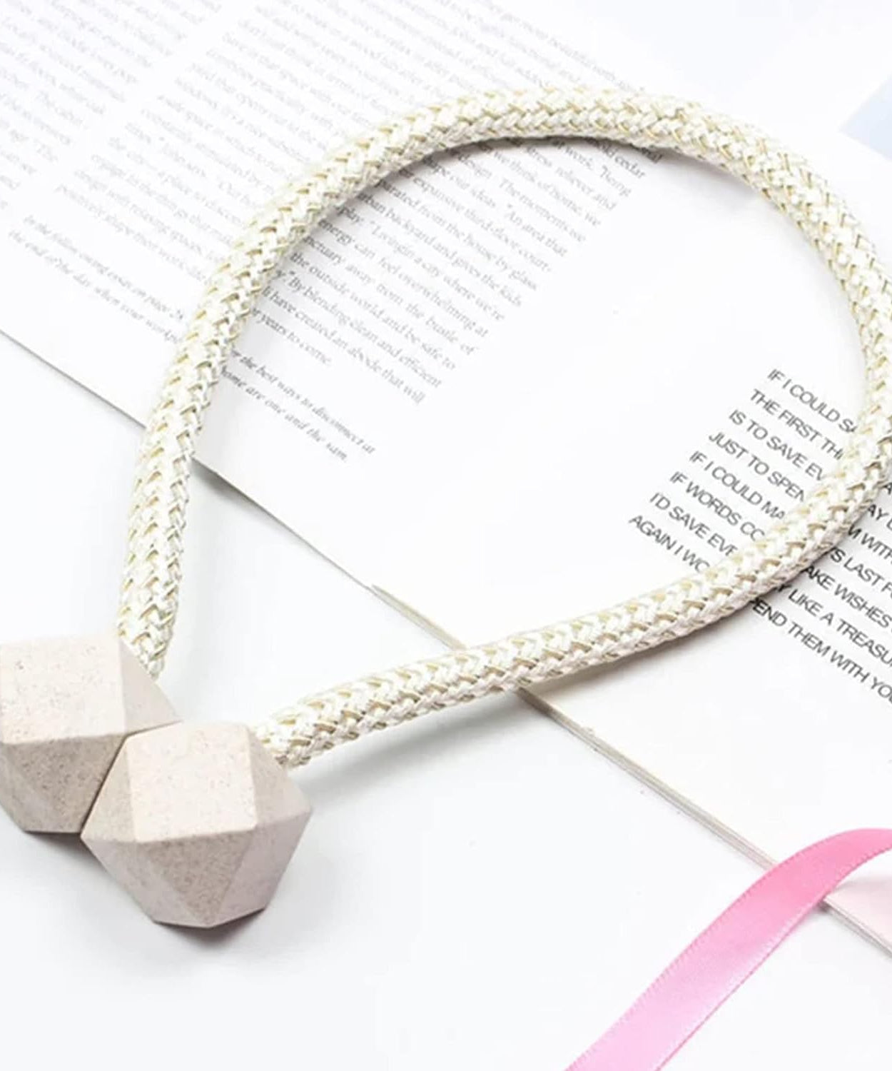 Non-magnetic curtain tiebacks with decorative pearls