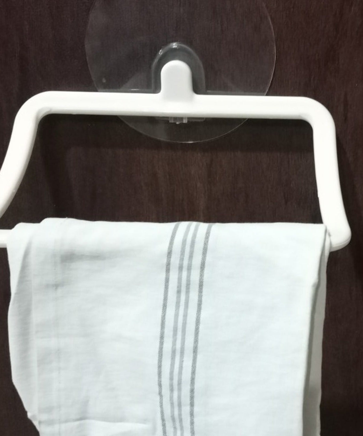 Self-adhesive wall towel hanger