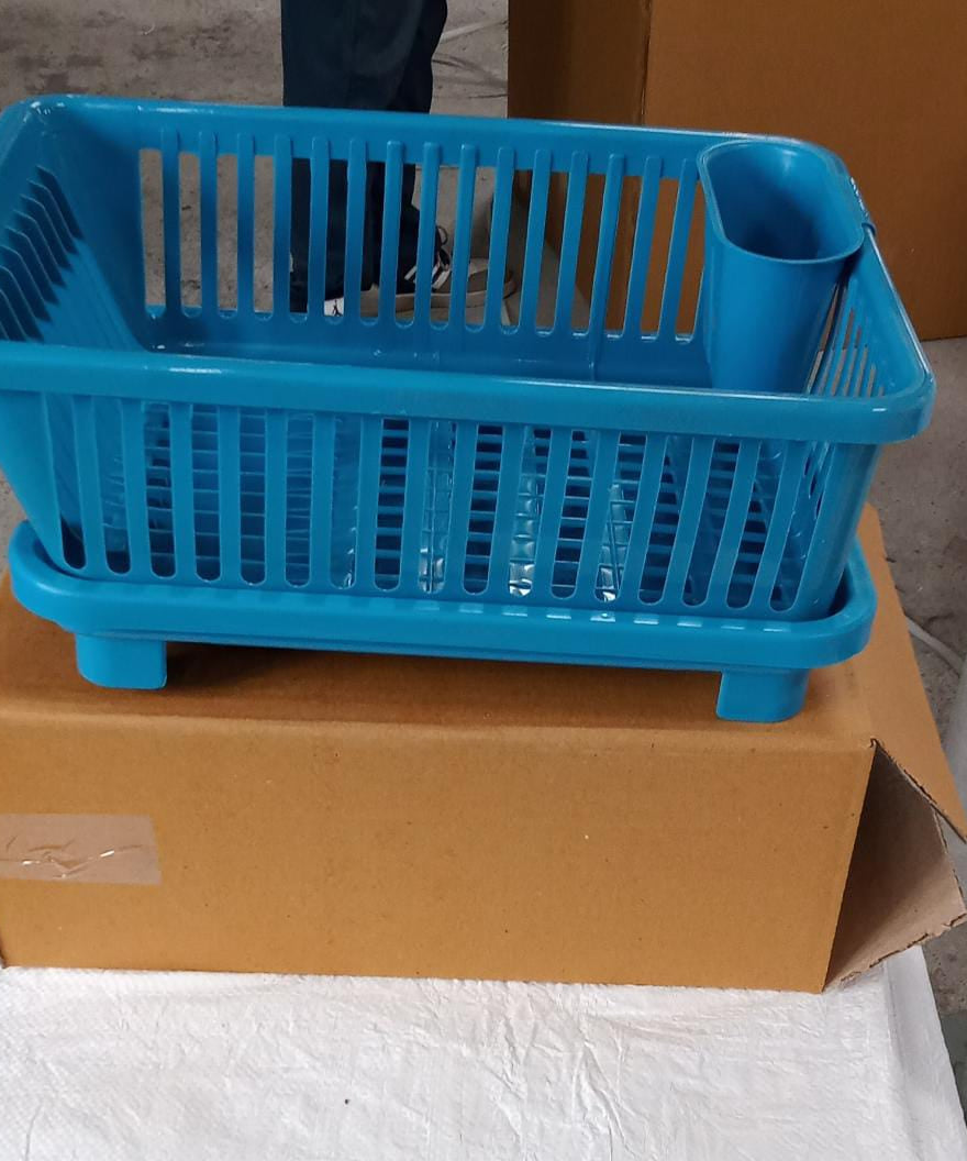 Dish drainer rack in a brown box, showing the plastic design for efficient drying