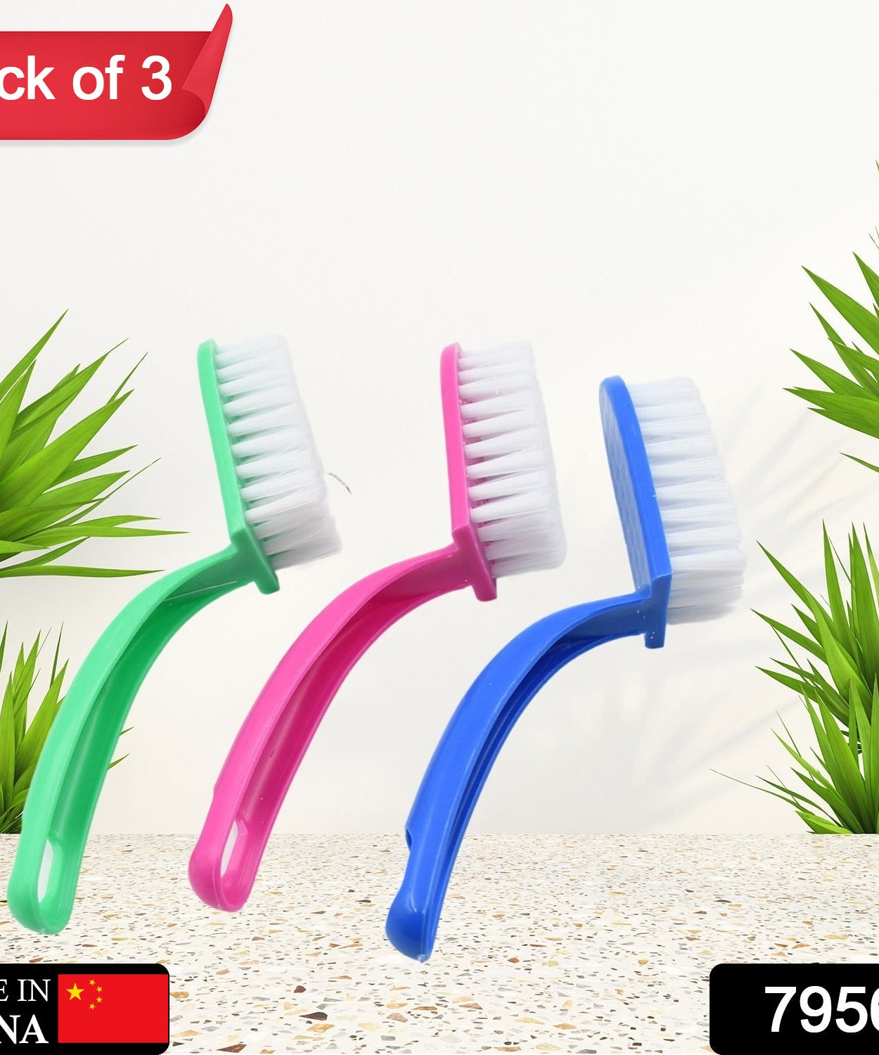Three-piece set of cleaning brushes for fruits and vegetables.
