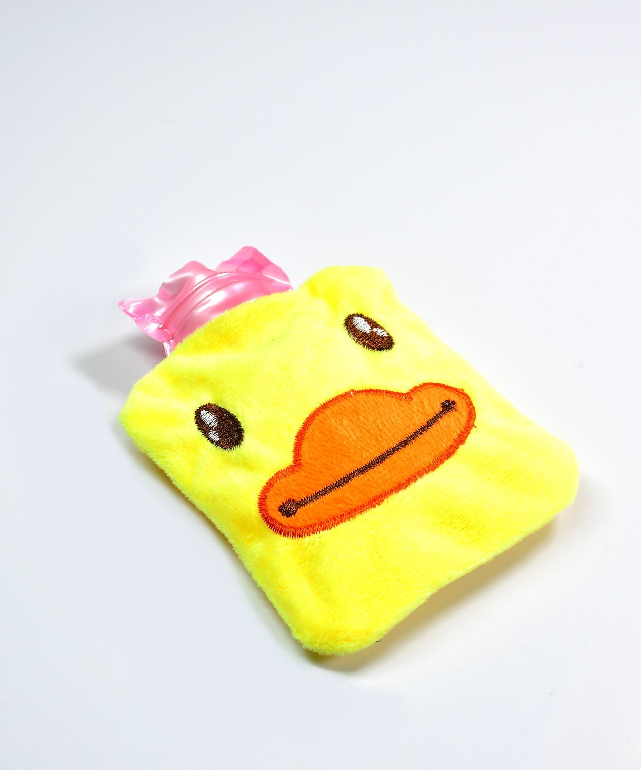 Small hot water bag with a yellow duck cover for various pains