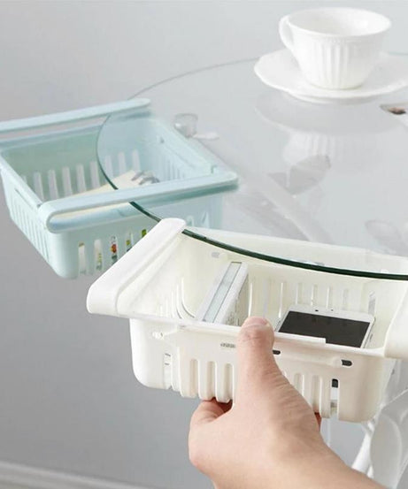 Adjustable fridge basket, showing expansion feature