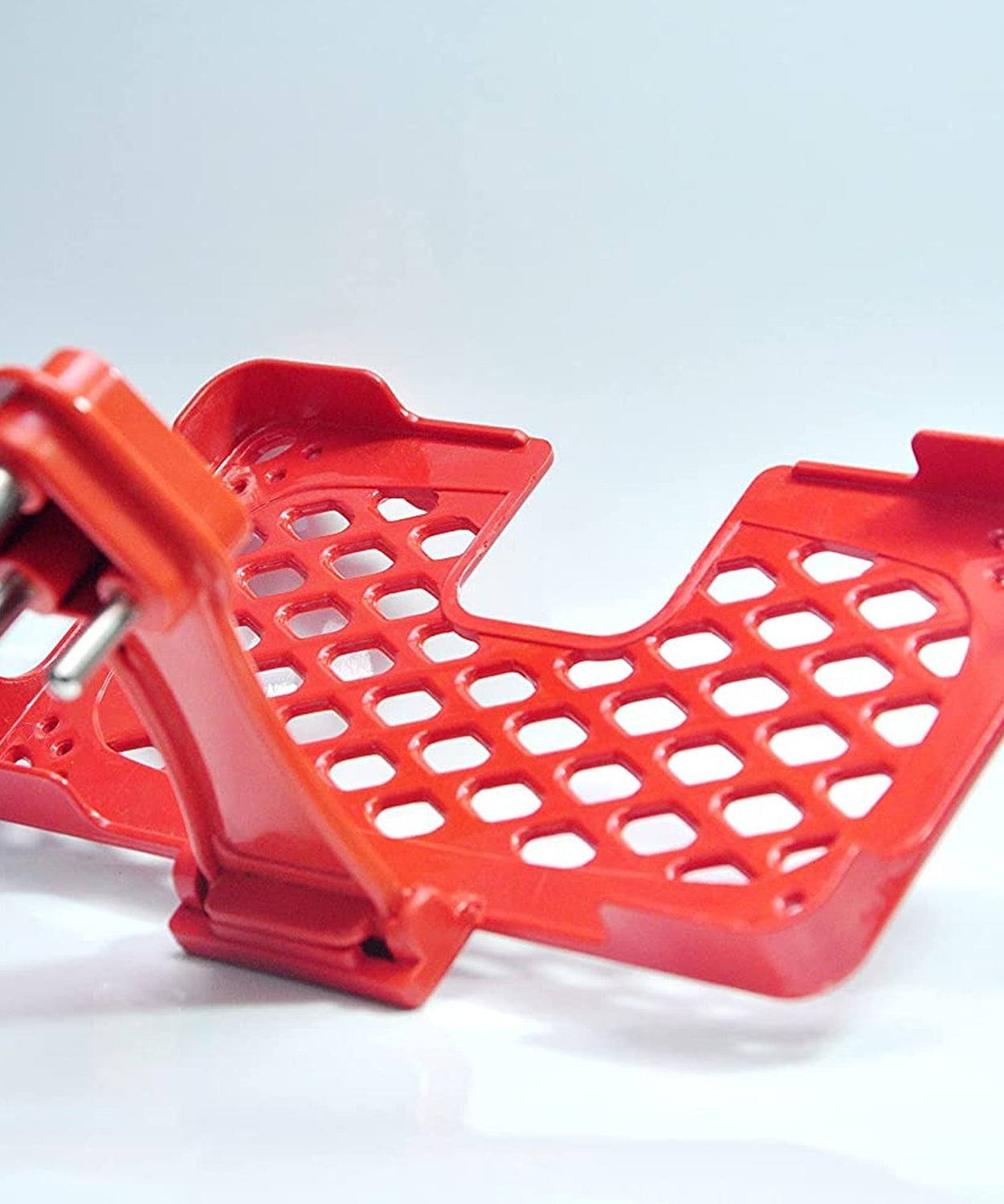 Red holder for mobile charging and hanging.